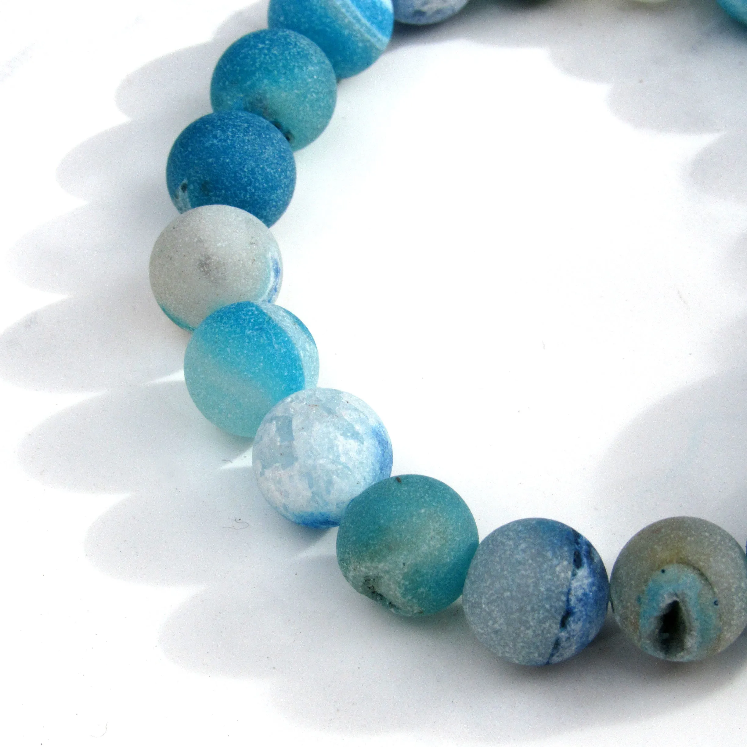 Blue Druzy Agate gemstones and Howlite Skull Stretch Bracelet