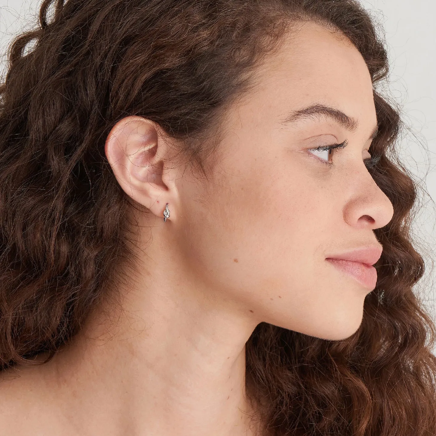 Silver Knot Huggie Hoop Earrings